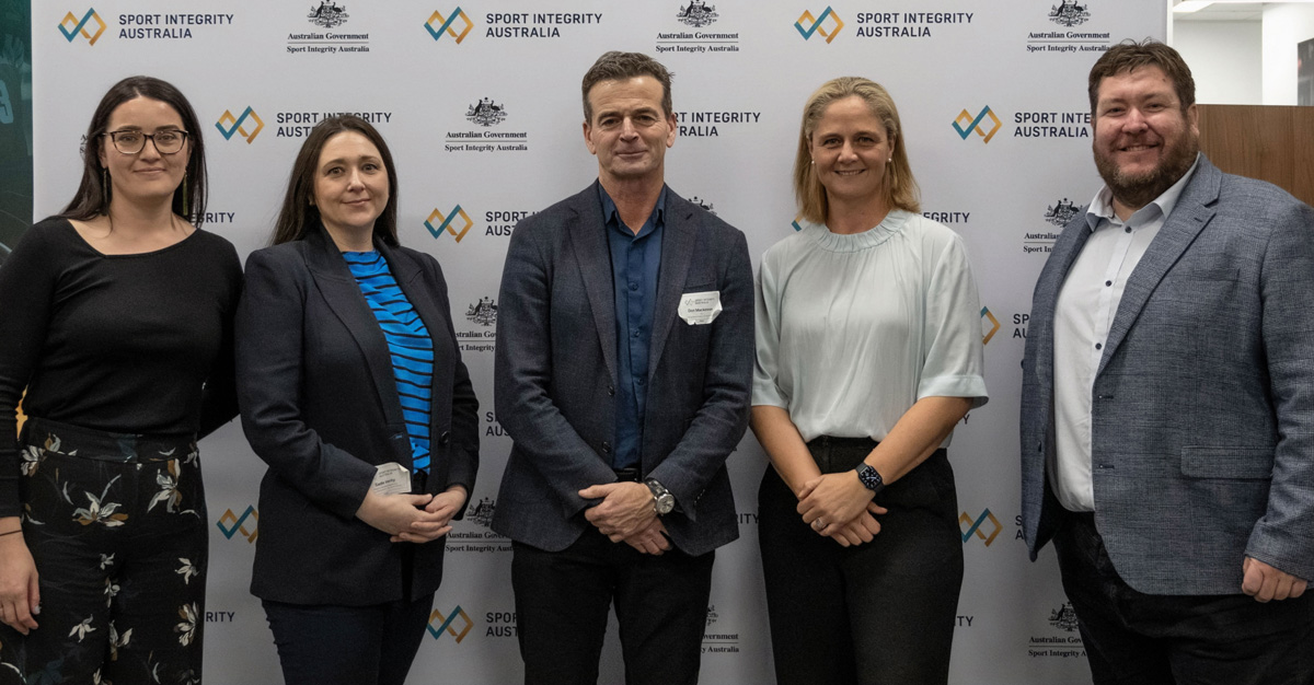 The NZ delegation comprised four officials from the Integrity Transition Program, pictured with Darren Mullaly